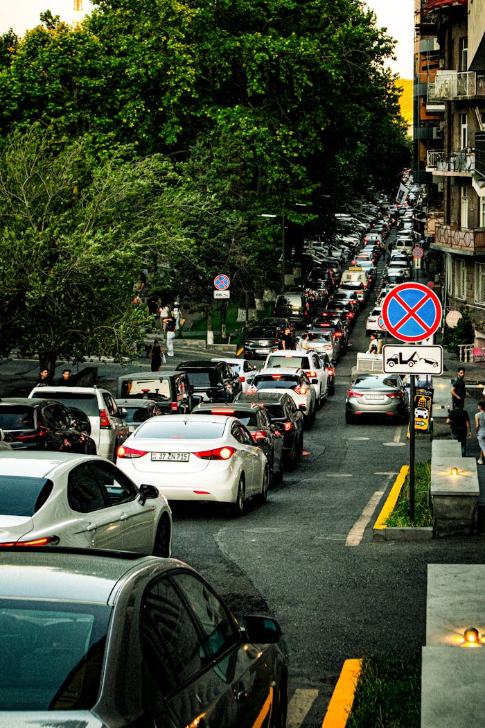 Dense evening traffic in Yerevan city, showcasing urban road congestion and city lifestyle.